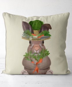 Pillow with Bunny wearing a hat with garden tools.